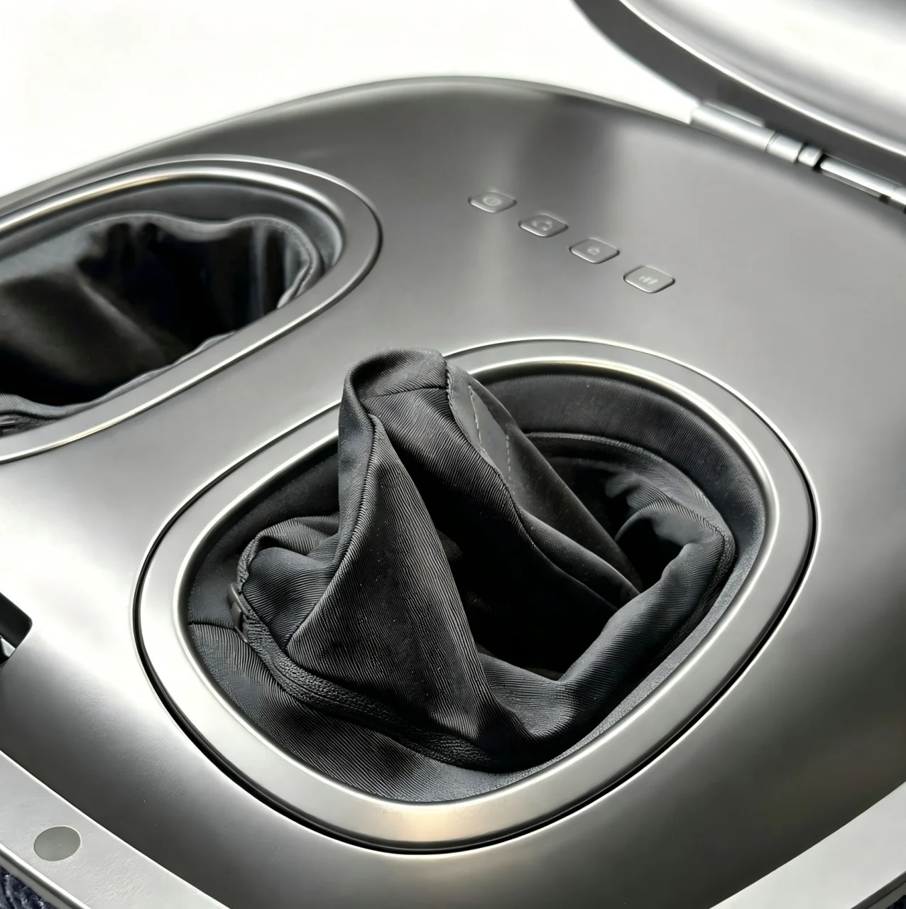 Open SolePod Pro showing the two foot compartments and washable inner liners