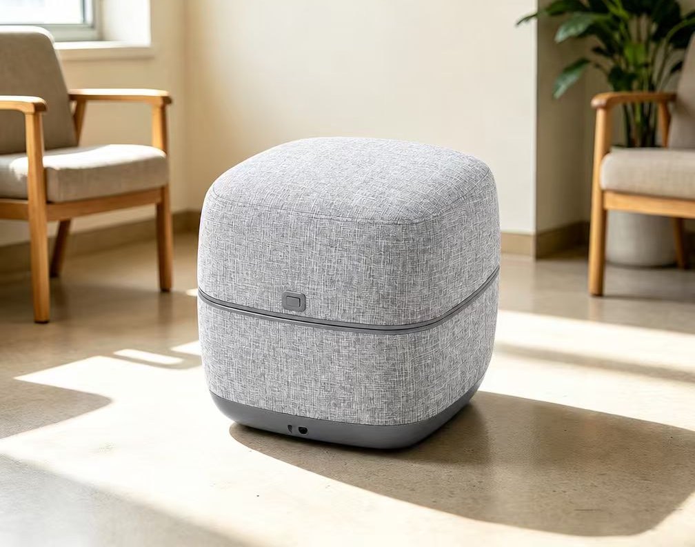 Grey SolePod Pro closed as an ottoman in a sunlit living room